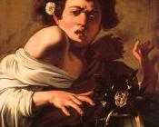 被一只绿色蜥蜴咬伤的男孩 - 米开朗基罗·梅里西·德·卡拉瓦乔